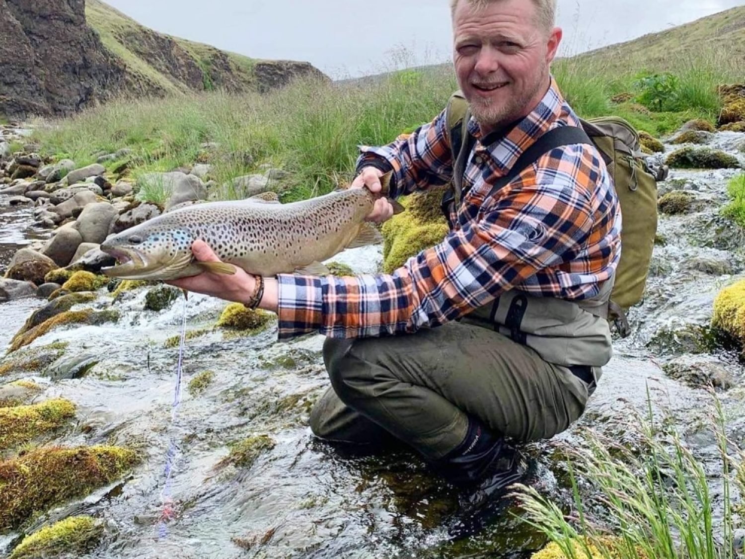 Oli, the dedicated fly fishing guide, is in action